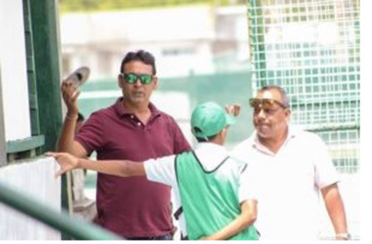 Anil Singh (left) executing his duties as a selector along with Chief Junior Selector Nazimul Drepaul