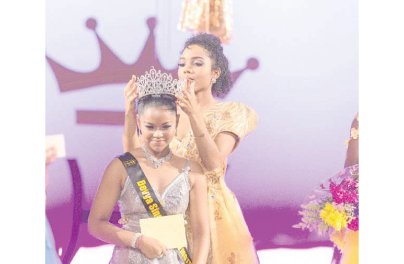 Devya Singh crowned by Miss Guyana Talented Teen 2016, Aliya Wong (Photo credit Fidal Bassier)
