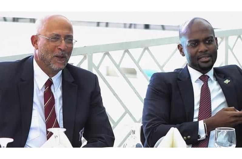 CWI president Ricky Skerritt(left) and vice-president Dr Kishore Shallow