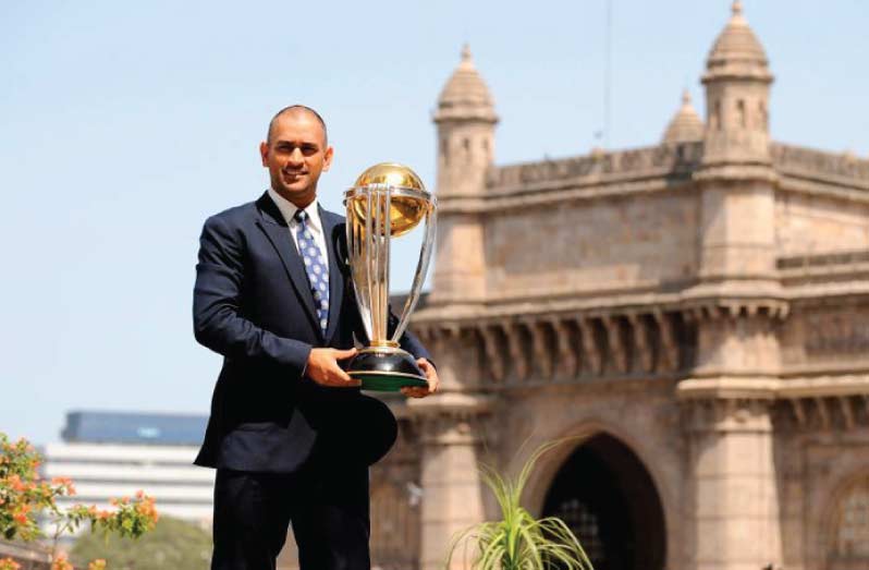 FLASHBACK: India's captain Mahendra Singh Dhoni lifts the trophy at the Taj hotel the day after India defeated Sri Lanka in the ICC Cricket World Cup final in Mumbai April 3, 2011. (REUTERS/Philip Brown)