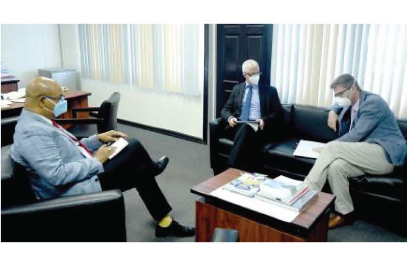 Minister of Public Works, Bishop Juan Edghill, discusses areas of mutual interest with the British High Commissioner, Gregory Quinn, and Deputy British High Commissioner, Mr. Ray Davidson.