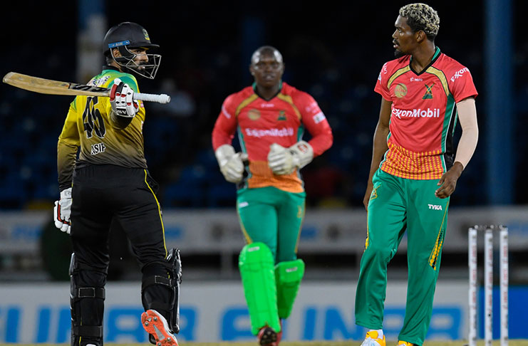 Asif Ali (L) of Jamaica Tallawahs expresses disappointment at being dismissed by Keemo Paul (R) of Guyana Amazon Warriors during the Hero CPL match 12 at Queen's Park Oval on August 25, 2020 in Port of Spain, Trinidad and Tobago. (Photo by Randy Brooks - CPL T20/CPL T20 via Getty Images)