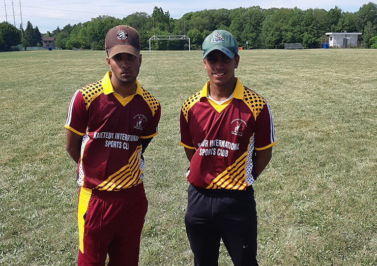 Marcus Nandu (right) and Arjuna Sukhu following their 90-run second wicket partnership.