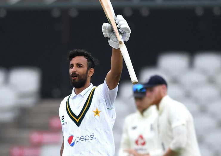 Shan Masood salutes the dressing-room after his hundred Getty Images