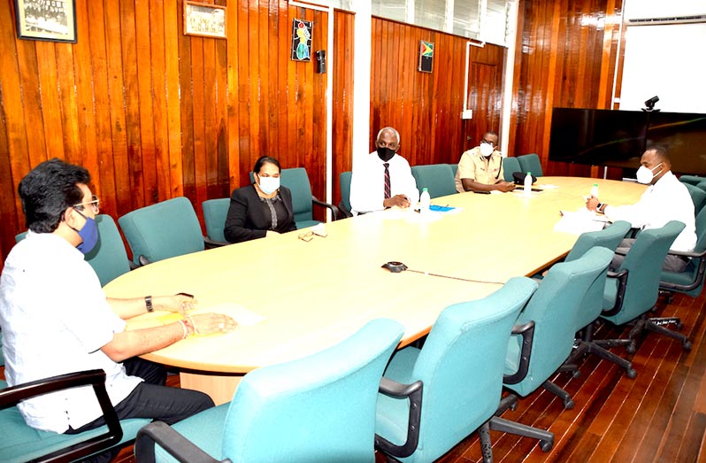 Attorney-General, Anil Nandlall, in discussion with Commissioner of Police (ag), Nigel Hoppie; Crime Chief, Wendell Blanhum; Head of the Financial Intelligence Unit, Matthew Langevine; Head of the Securities Council, Cheryl Ibbot and Central Bank Governor, Dr Gobind Ganga who joined the meeting virtually
