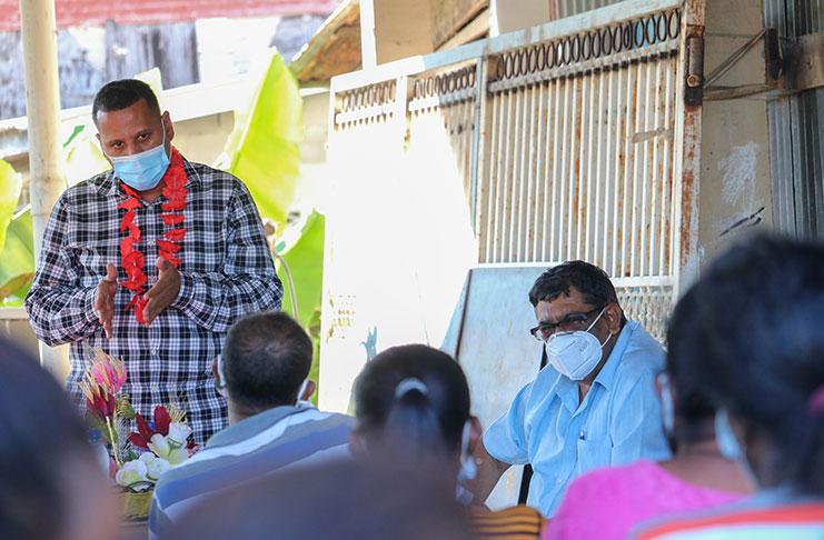 Housing and Water Minister, Collin Croal interacting with residents of Region Six