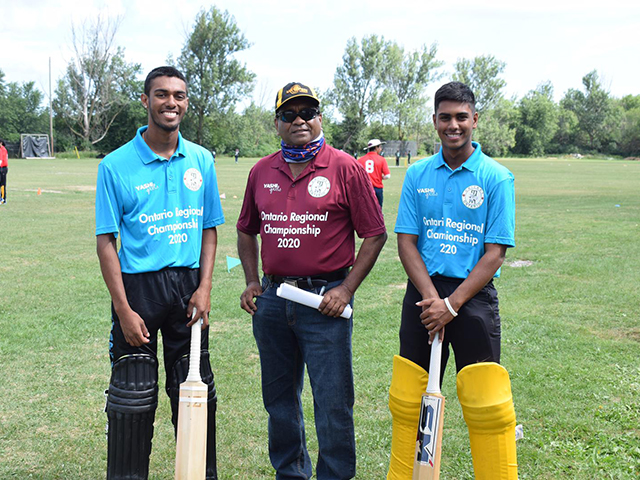 Matthew Nandu (right) with Cricket Ontario Junior Coordinator, Vish Jadunauth (centre). At left is Kaieteur International B teammate Navin Nauth.