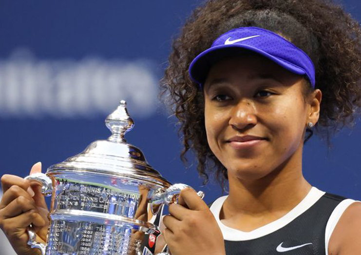 Naomi Osaka holds the US Open trophy after beating Victoria Azarenka in yesterday’s US Open final
 with a superb comeback victory the Billie Jean King National Tennis Centre..