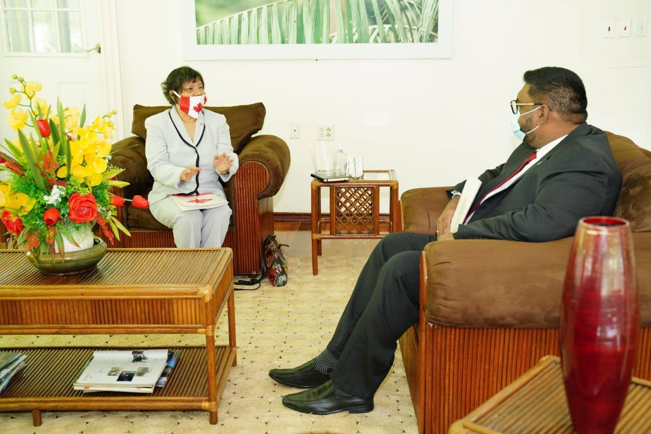 President, Dr Irfaan Ali in discussion with Canadian High Commissioner, Lilian Chatterjee at State House on Monday (OP photo)