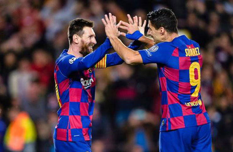 Suarez (right) has left Barcelona after six years.