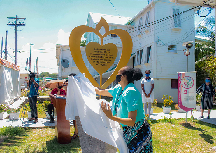 Sister Julie Matthews unveils the monument dedicated to the Sisters of Mercy