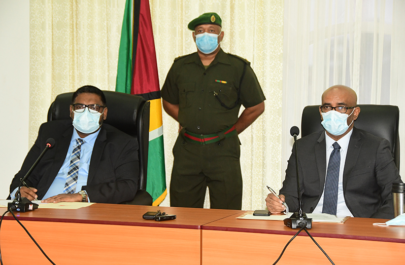 President, Dr Irfaan Ali, and Vice-President, Bharrat Jagdeo, at their press briefing on Monday (Adrian Narine photo)