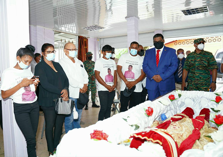 President Dr. Irfaan Ali views Singh's remains