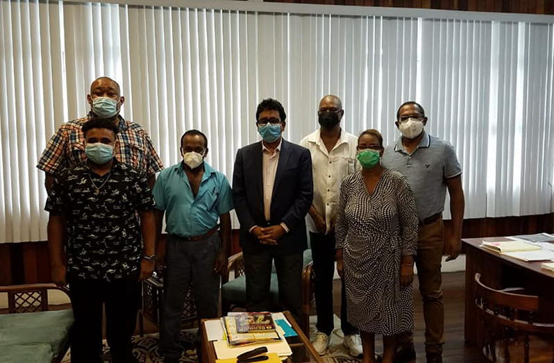 Attorney General and Minister of Legal Affairs Anil Nandalal flanked by members of the Berbice Cricket Board following their meeting on October 13. (Photo Compliments: BCB)