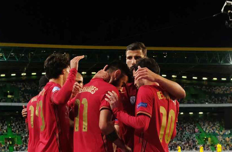 Portugal's Bernardo Silva celebrates scoring their first goal with teammates (Reuters)