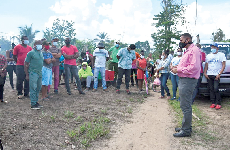 Minister of Housing and Water Collin Croal engages residents of several communities during an outreach in Bartica on Saturday