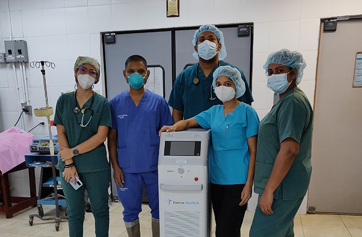 Dr Sukhraj (second from left) with the operating room team