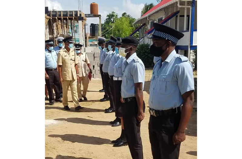Commander Ramlakhan and team ‘inspecting’at a police station within the division.