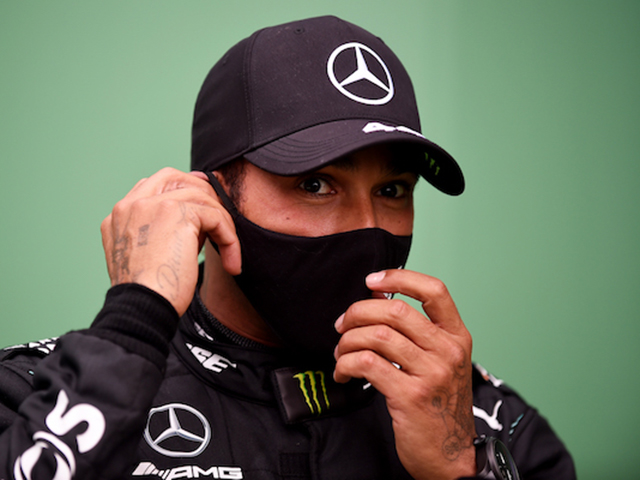 Formula One F1 - Portuguese Grand Prix - Algarve International Circuit, Portimao, Portugal - October 25, 2020. Mercedes' Lewis Hamilton after winning the race Pool via REUTERS/Jorge Guerrero