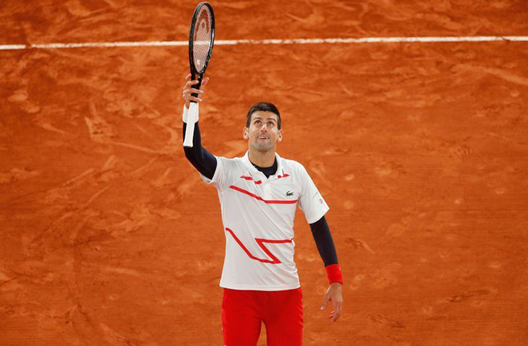 Serbia's Novak Djokovic reacts after winning his quarterfinal match against Spain's Pablo Carreno Busta at Roland Garros, Paris. (REUTERS/Gonzalo Fuentes)