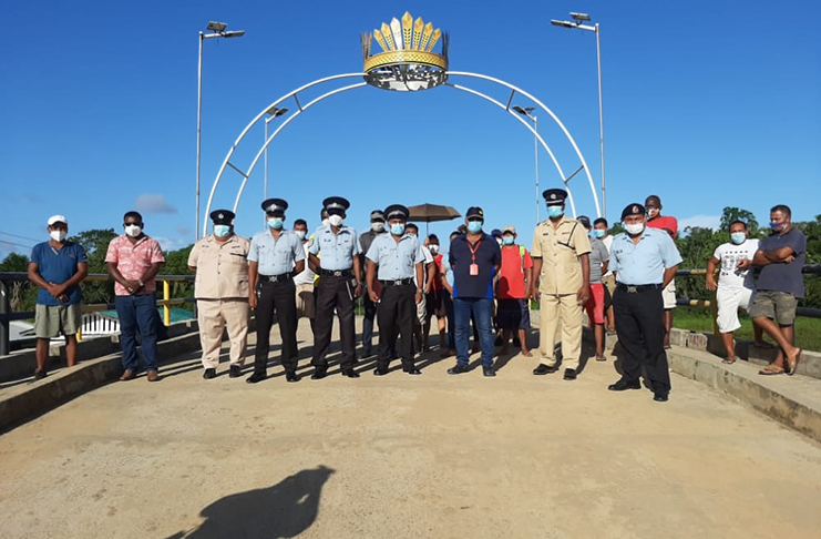 Commander Ramlakhan (second from right) with ranks and stakeholders of the team policing group at the Santa Rosa Arch after the creation of the group