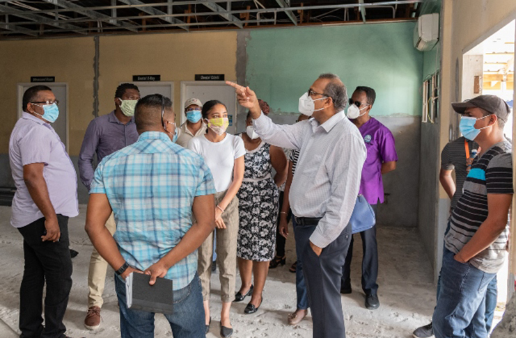 Health Minister, Dr. Frank Anthony makes a point during a tour of the East Demerara Regional Hospital, which is currently being upgraded (DPI photo)