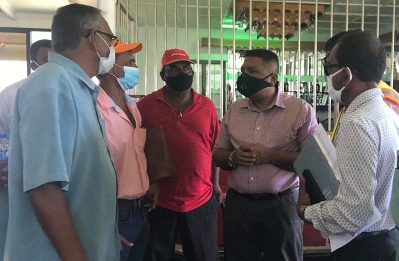 Agriculture Minister, Zulfikar Mustapha, speaks with private cane farmers at the Skeldon Training Centre