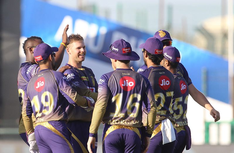KKR players gather around Lockie Ferguson after he removed Kane Williamson with his first ball of the tournament © BCCI