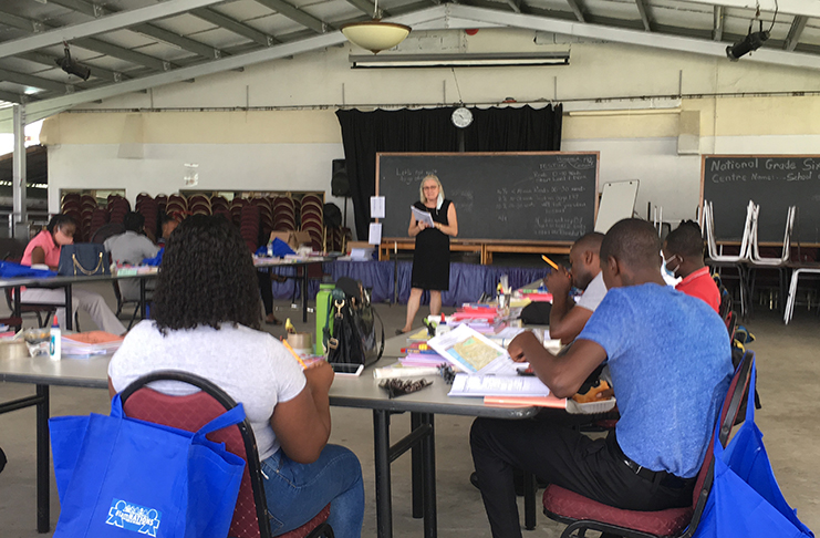 Pamela O'Toole teaching the literacy class with prison officers