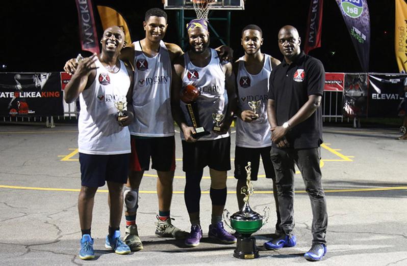 Pitbulls 3.0 celebrate becoming the champions of the Rawle Toney/Mackeson 3x3 Basketball Classic in November 2019. The organier, Rawle Toney, stands at far right.
