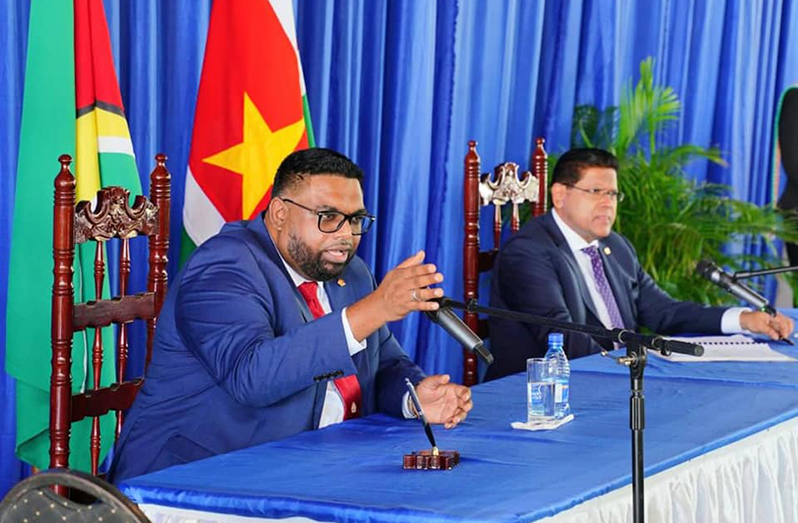 President Irfaan Ali and Suriname’s President Chandrikapersad Santokhi at a joint press conference in the Surinamese capital, Paramaribo, on Tuesday