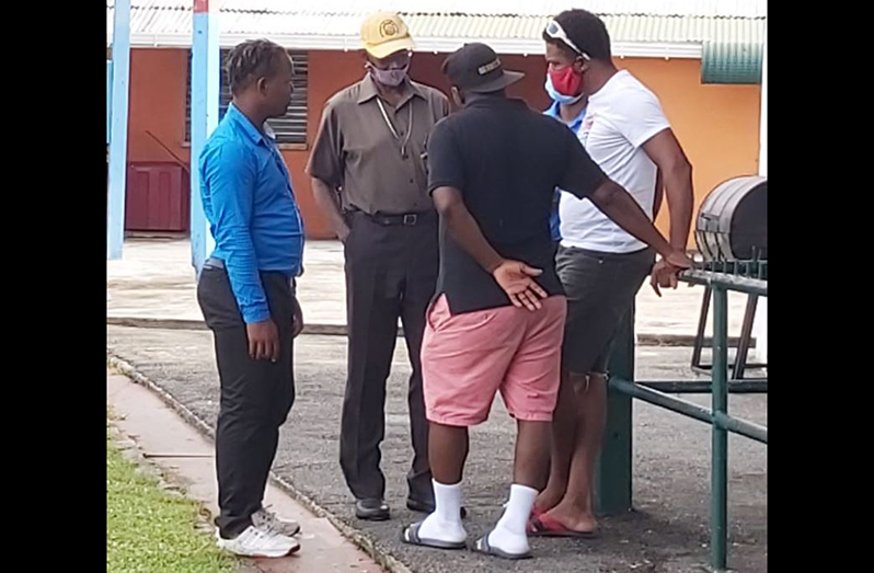 Officials having a chat following no play at Everest