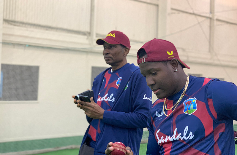 West Indies head selector Roger Harper and all-rounder Rovman Powell have a chat during a recent training session in New Zealand.