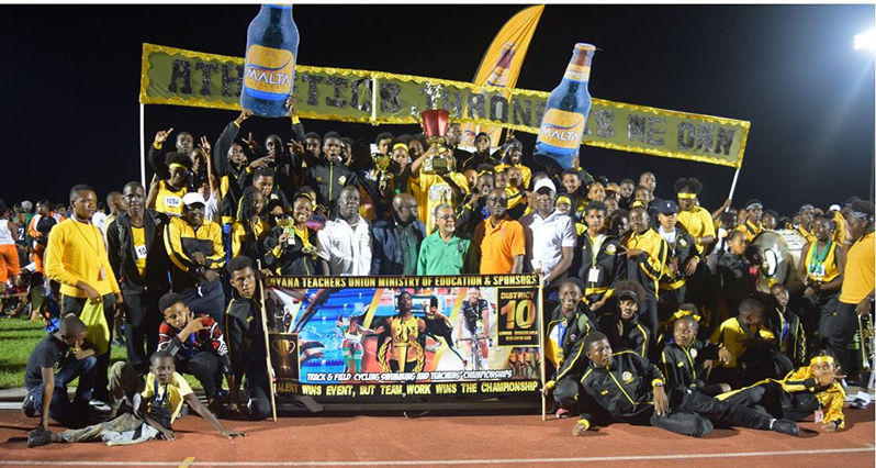 Flashback! District 10, Upper Demerara/Kwakwani, celebrates securing the overall title of the 59th National Schools Track and Field, Cycling and Swimming Championship.