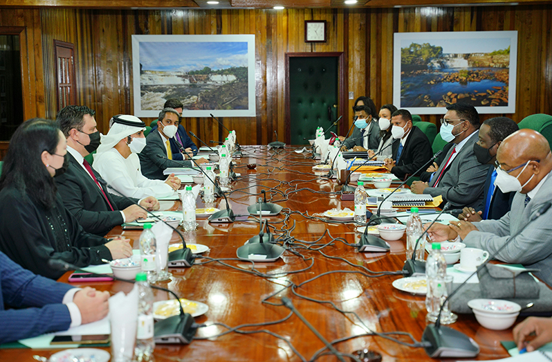 President Dr. Irfaan Ali (third right) and his team of ministers meeting with His Highness Sheikh Ahmed Dalmook Al Maktoum (fourth left) and
his delegation from the UAE at the Office of the President (Office of the President photograph)