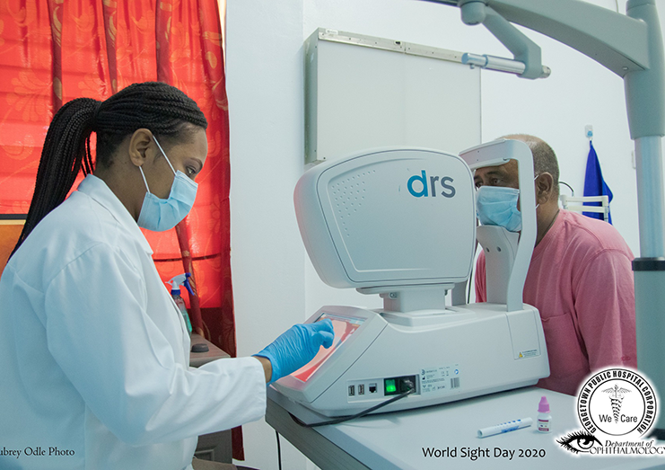 Dr. Malissa Elias conducting an eye screening for Diabetic Retinopathy