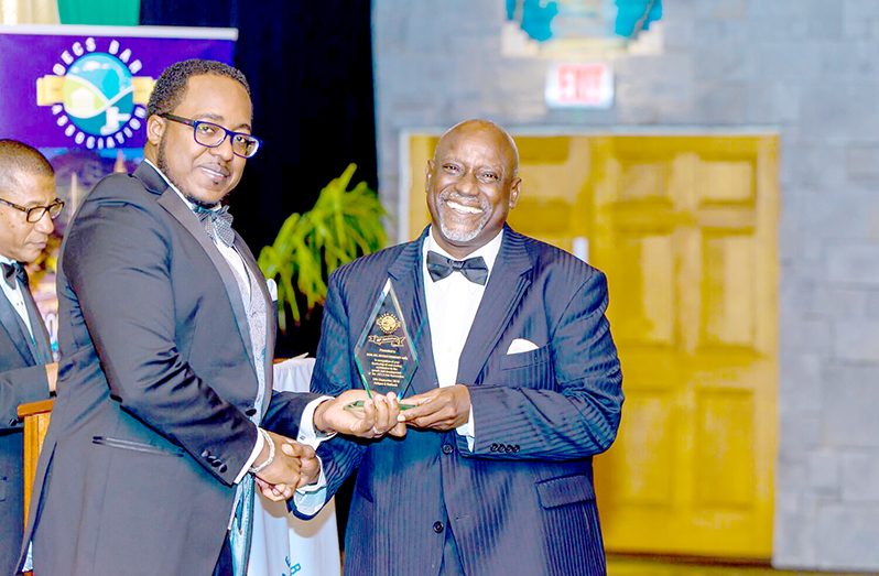 Justice Abel receiving an Award for Distinguished Service
to the OECS Bar Association