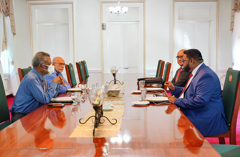 President Dr. Irfaan Ali in discussions with former Presidents Donald Ramotar, Samuel Hinds and Bharrat Jagdeo at State House (OP photo)