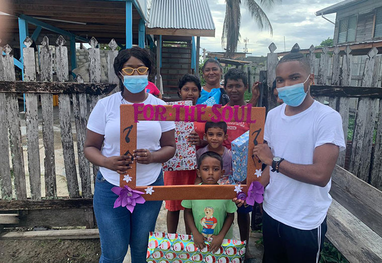 Members of the ‘For the soul Guyana’ youth group donated gifts and hampers to this family