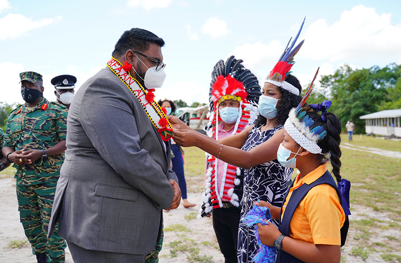 President Irfaan Ali is greeted by residents of Kaikan