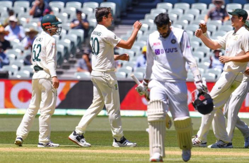 Jasprit Bumrah trudges off after becoming one of Australia's victims as India crashed to a historic low of 36 runs.