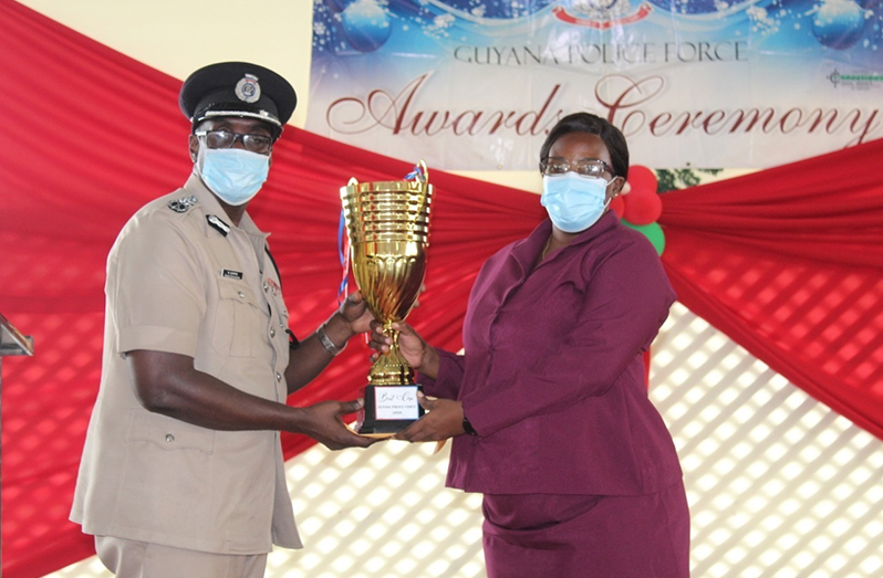 Best Cop, Woman Detective Sergeant Melanie Hale, receives her award from Commissioner of Police (ag) Nigel Hoppie