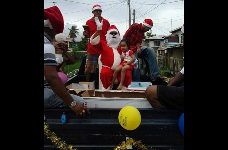A ‘village uncle’ dresses up as Santa and visits
children in Success on Christmas morning