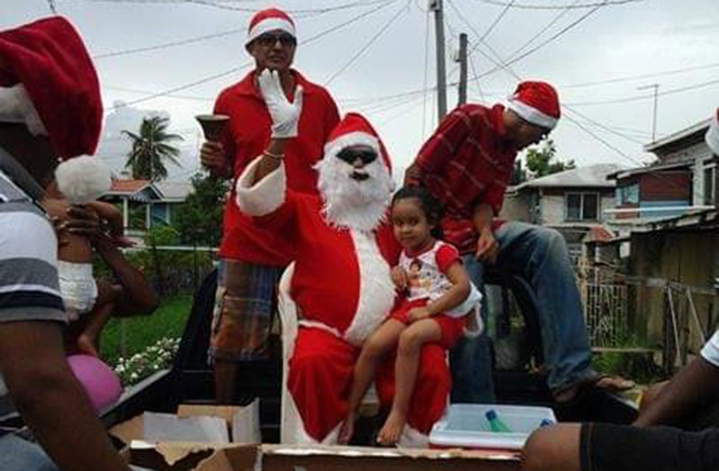 A ‘village uncle’ dresses up as Santa and visits children in Success on Christmas morning