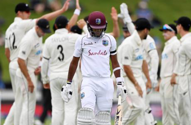 The West Indies’ Kraigg Brathwaite walks off after being dismissed by New Zealand’s Trent Boult on day three of the first Test match in Hamilton, New Zealand, on Saturday, December 5.