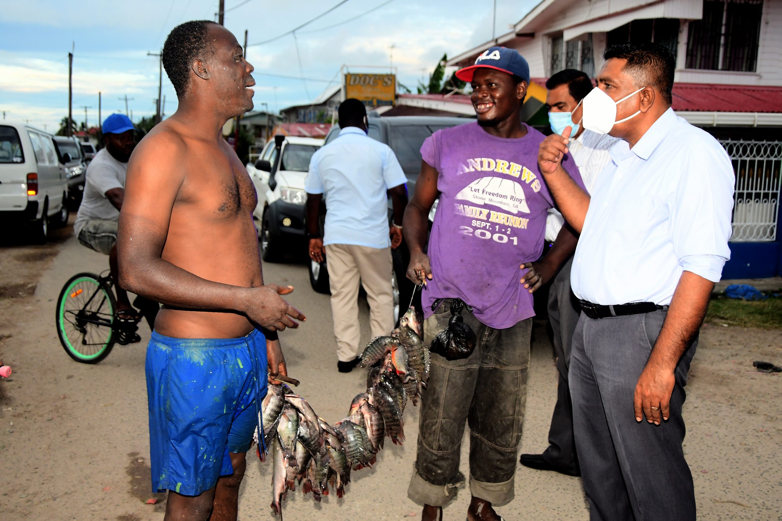 Agriculture Minister, Zulfikar Mustapha, interacting with fishermen and farmers on Wednesday (Adrian Narine photo)