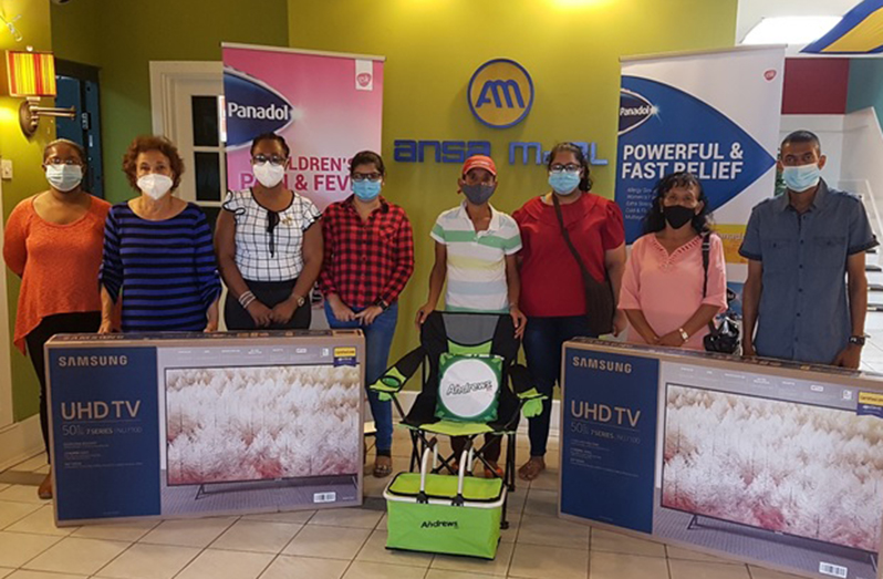 The winners: From Left: Rajshree Liloo, Laurentina King, Malkia Idal, Kumarie Persaud, Sister of Frank Woon (winner), Mahadai Sukhdeo, Louise Paul, S.M.K. Khudadin