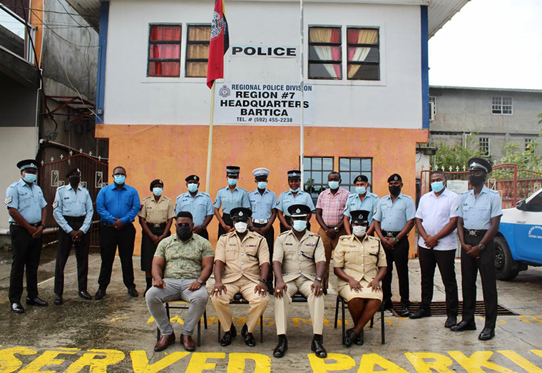 Seated at second from right: Police Commander of Region Seven (Cuyuni-Mazaruni), Senior Superintendent Dion Moore and other senior ranks flanked by the newly promoted police officers