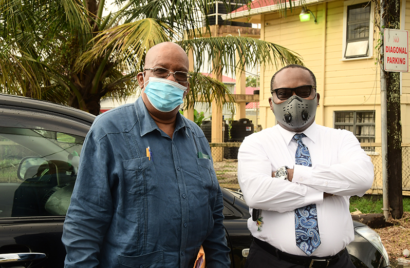 Former Finance Minister, Winston Jordan, with his attorney Roysdale Forde, S.C. (Adrian Narine photo)