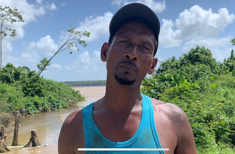 Shamazudeen Nezamudeen, whose cassava and pumpkin crops are under water. He has 100 acres of land under cultivation